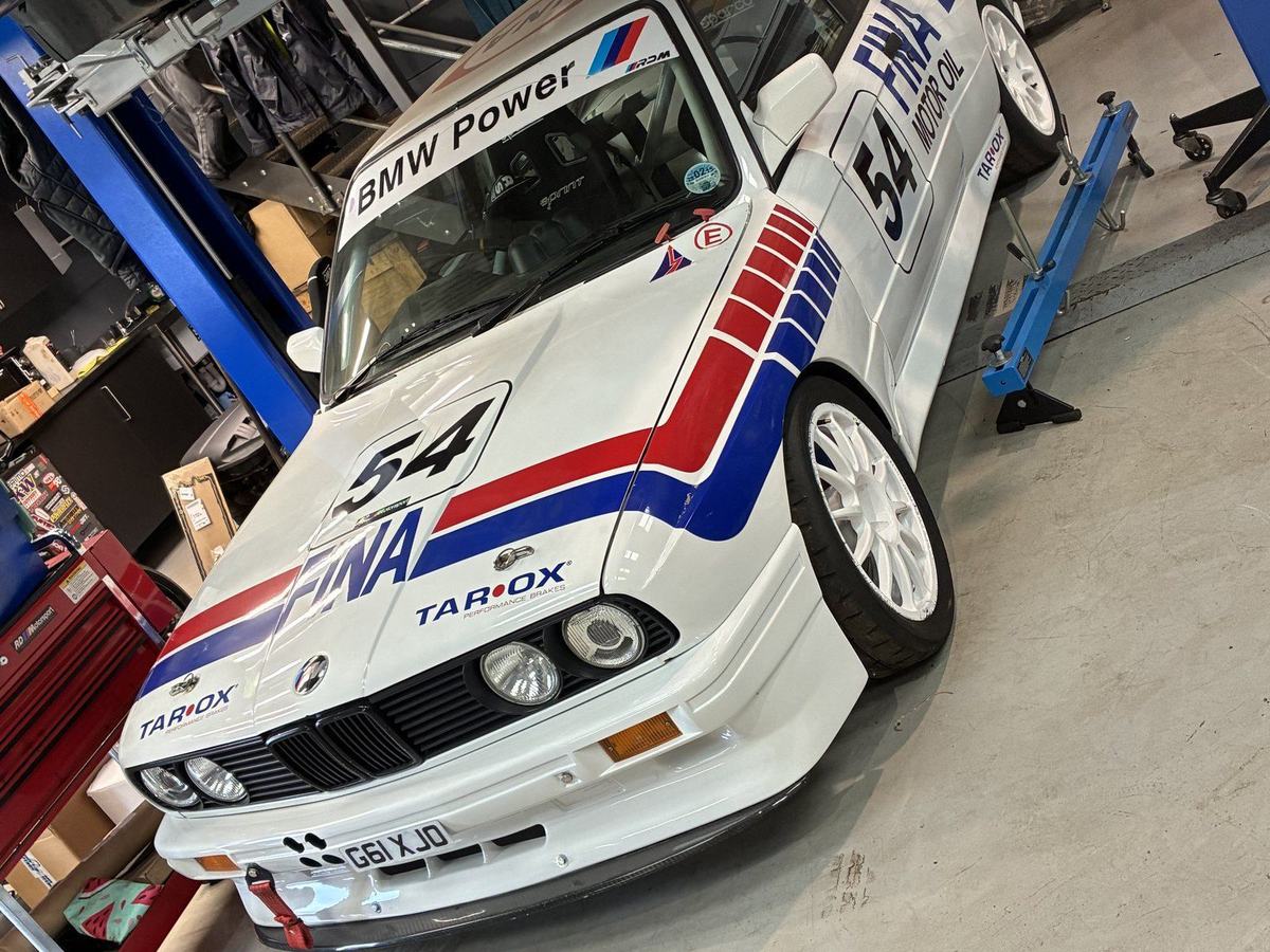 RDM's E30 M3 race car in the workshop